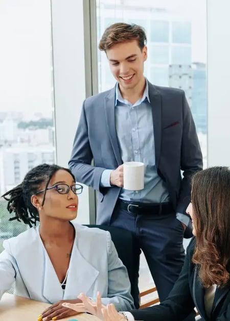 People working in procurement discussing ways to improve processes and considering contract management as an option. People working in procurement discussing ways to improve processes and considering contract management as an option.